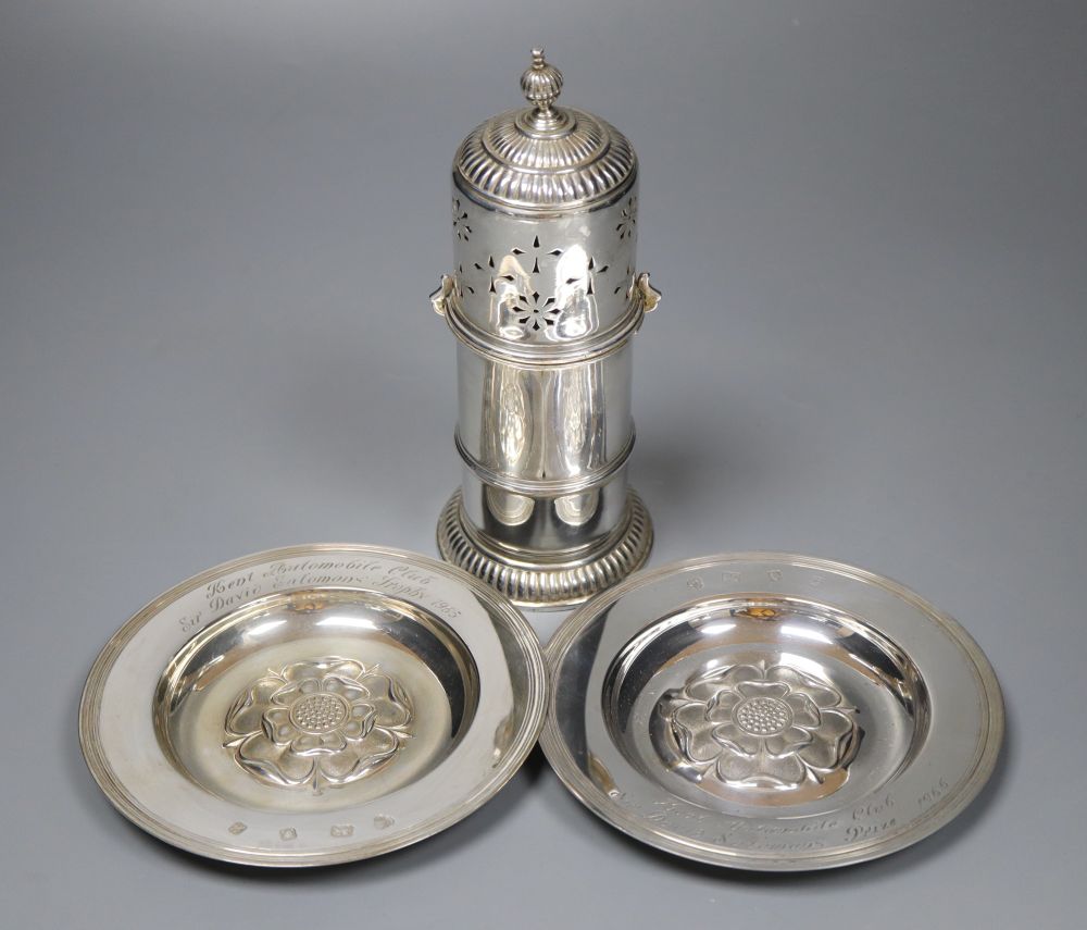 A silver sugar caster, William Comyns, London 1929 and a pair of silver presentation Tudor rose dishes, 1966, 16.5oz.